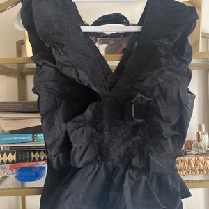 Sleeveless V Neck Ruffle Shirt